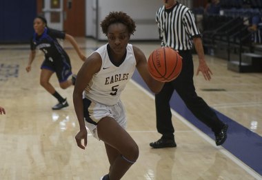 Former Lemoore High School star Kiesha Loftin scored six points in Friday night's loss to San Mateo.